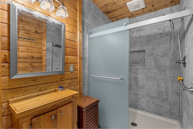 142 Lyons Rd, Stevenson, WA 98648 - full bathroom featuring tiled shower and wood walls
