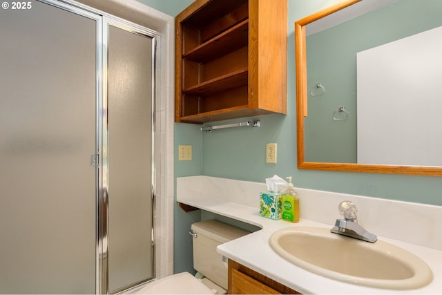 142 Lyons Rd, Stevenson, WA 98648 - full bathroom featuring a stall shower, vanity, and toilet
