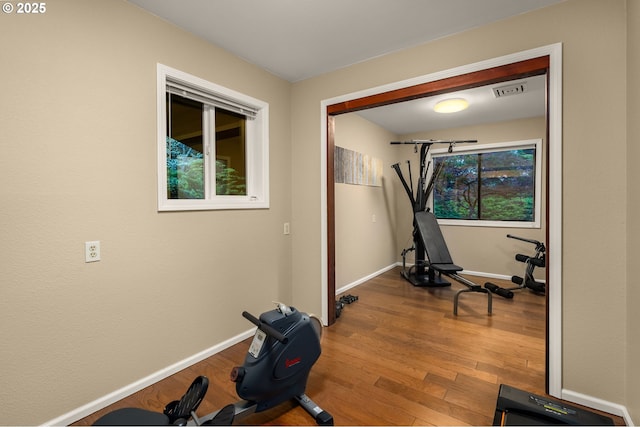 142 Lyons Rd, Stevenson, WA 98648 - workout room with wood finished floors and baseboards