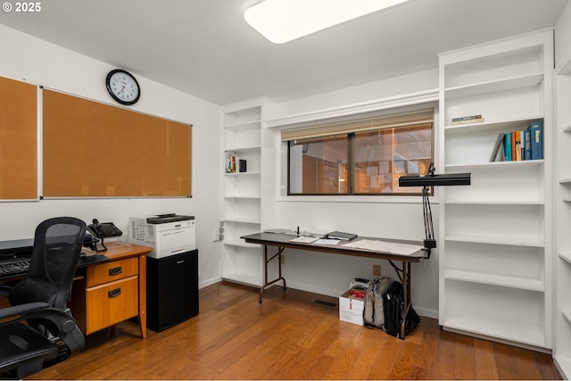 142 Lyons Rd, Stevenson, WA 98648 - home office with wood finished floors