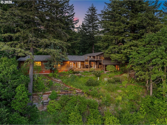 142 Lyons Rd, Stevenson, WA 98648 - back of property at dusk with a forest view