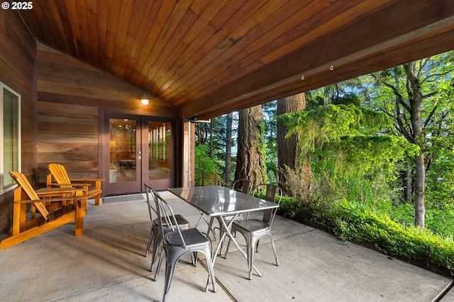 142 Lyons Rd, Stevenson, WA 98648 - wooden terrace with french doors, outdoor dining space, and a patio area