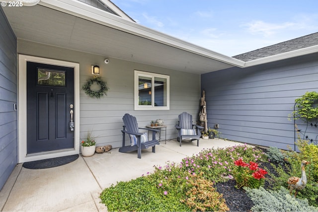4635 Chaucer Ct, Depoe Bay, OR 97341 - view of exterior entry featuring a security system and covered porch