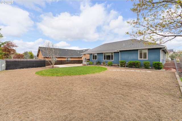 292 Jamie Loop, Roseburg, OR 97471 - back of property featuring a patio and a shingled roof