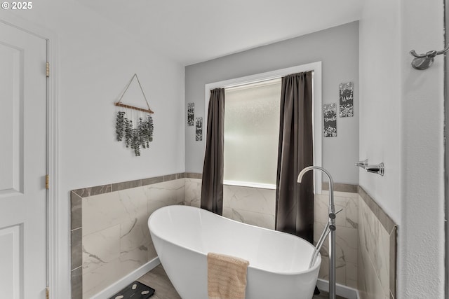 292 Jamie Loop, Roseburg, OR 97471 - full bath with tile walls, wainscoting, and a freestanding bath