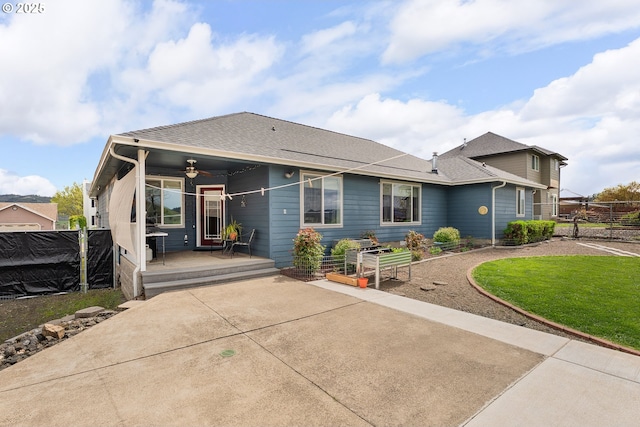 292 Jamie Loop, Roseburg, OR 97471 - back of property featuring a ceiling fan and roof with shingles