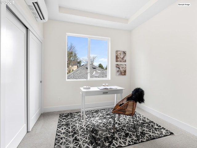 office with baseboards, light carpet, visible vents, and a wall unit AC