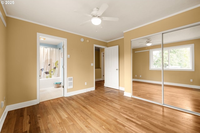 154 Ridgeway Rd, Lake Oswego, OR 97034 - unfurnished bedroom featuring light wood-style flooring, a closet, baseboards, ornamental molding, and ensuite bathroom