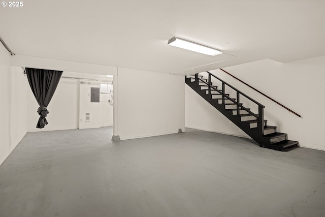 finished below grade area with stairs and electric panel