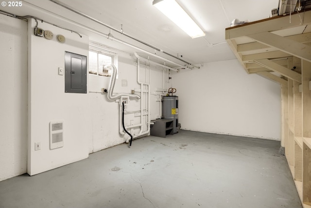 basement with electric panel and water heater
