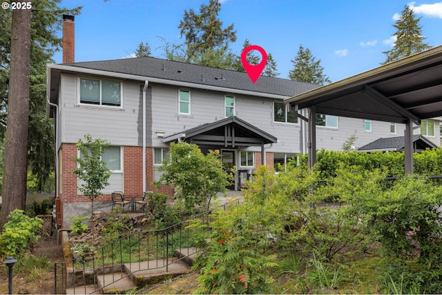 154 Ridgeway Rd, Lake Oswego, OR 97034 - rear view of property featuring a chimney and brick siding