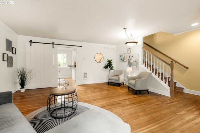 154 Ridgeway Rd, Lake Oswego, OR 97034 - living room with light wood-style flooring, baseboards, a barn door, and stairway
