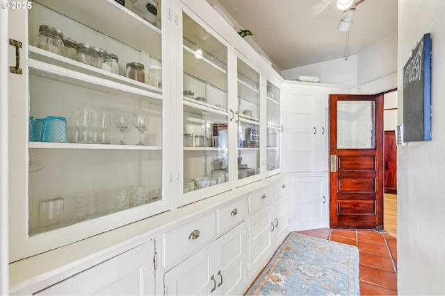 2058 NW Flanders St Unit 5-2, Portland, OR 97209 - kitchen featuring black range with electric cooktop, butcher block counters, open shelves, a sink, and ceiling fan