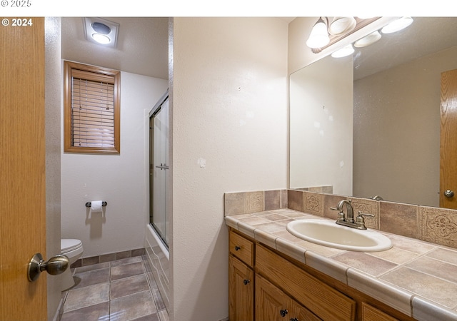 2703 Moon Mountain Dr, Eugene, OR 97403 - full bathroom with vanity and enclosed tub / shower combo