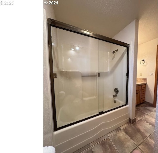 2703 Moon Mountain Dr, Eugene, OR 97403 - full bathroom featuring tile patterned floors, vanity, and enclosed tub / shower combo