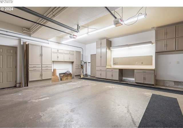 2703 Moon Mountain Dr, Eugene, OR 97403 - garage featuring a garage door opener