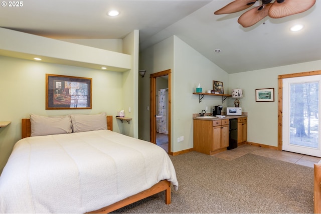 carpeted bedroom with ceiling fan, sink, access to exterior, and lofted ceiling