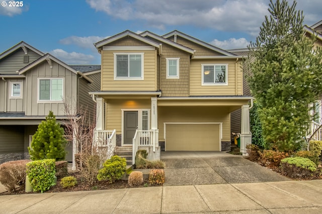 craftsman-style home featuring a garage and driveway