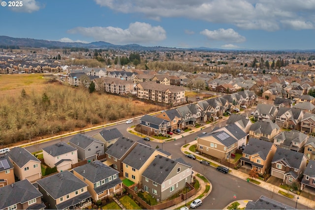 bird's eye view with a residential view and a mountain view