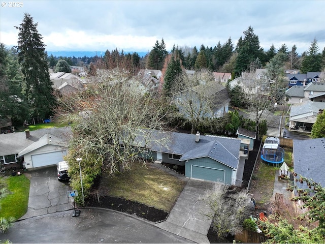 birds eye view of property with a residential view