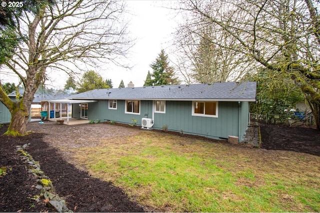 back of property featuring ac unit, a patio, a chimney, a lawn, and fence