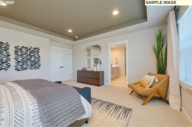 1449 NE Josephine Ct Unit 170, Estacada, OR 97023 - bedroom with light colored carpet, recessed lighting, baseboards, multiple windows, and ensuite bathroom