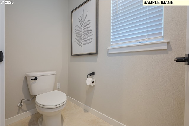 1449 NE Josephine Ct Unit 170, Estacada, OR 97023 - bathroom featuring baseboards and toilet