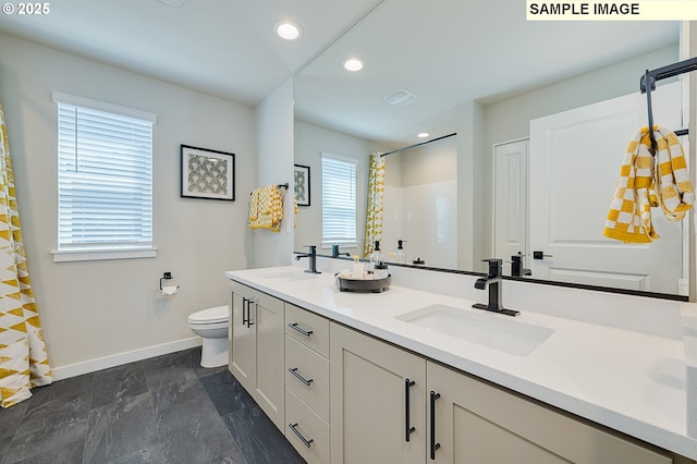 1449 NE Josephine Ct Unit 170, Estacada, OR 97023 - bathroom with baseboards, double vanity, toilet, curtained shower, and recessed lighting
