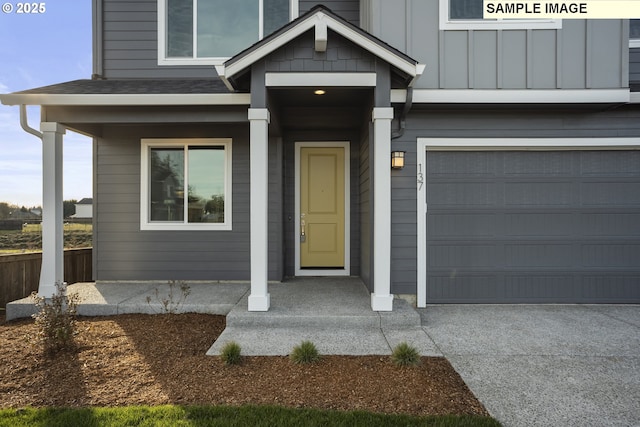 1449 NE Josephine Ct Unit 170, Estacada, OR 97023 - entrance to property featuring an attached garage, roof with shingles, board and batten siding, and a porch
