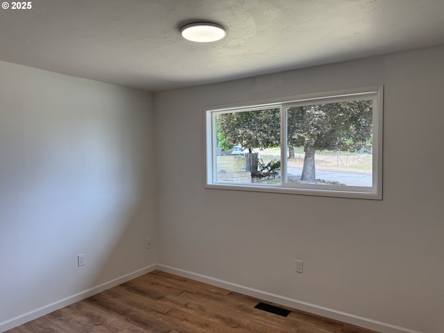 807 Glover St, Goldendale, WA 98620 - unfurnished room featuring wood finished floors and baseboards