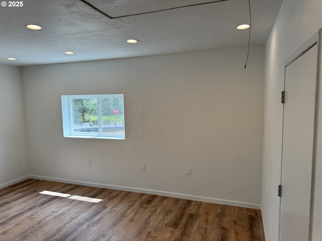 807 Glover St, Goldendale, WA 98620 - spare room with recessed lighting, wood finished floors, and baseboards