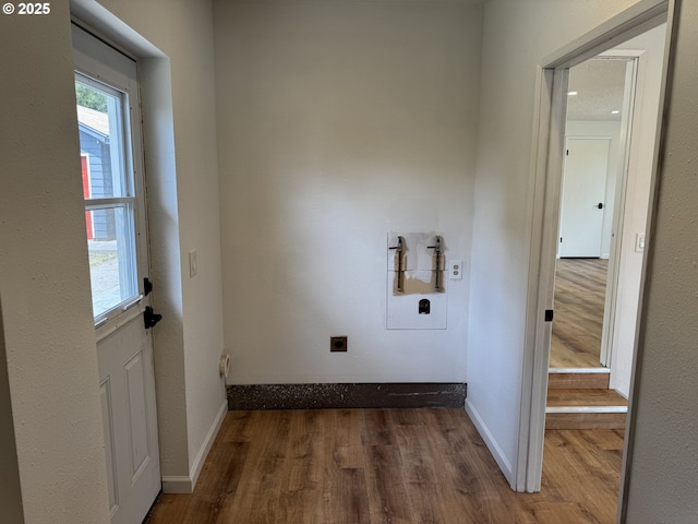 807 Glover St, Goldendale, WA 98620 - laundry area with wood finished floors, hookup for an electric dryer, and baseboards