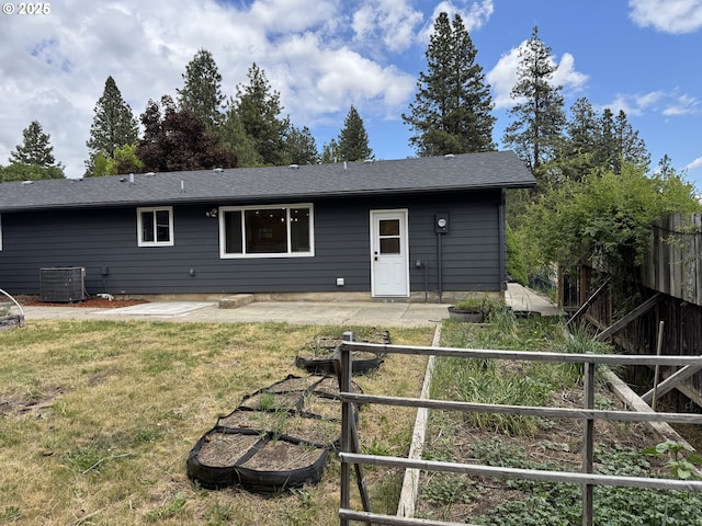 807 Glover St, Goldendale, WA 98620 - back of property with a patio and central AC unit