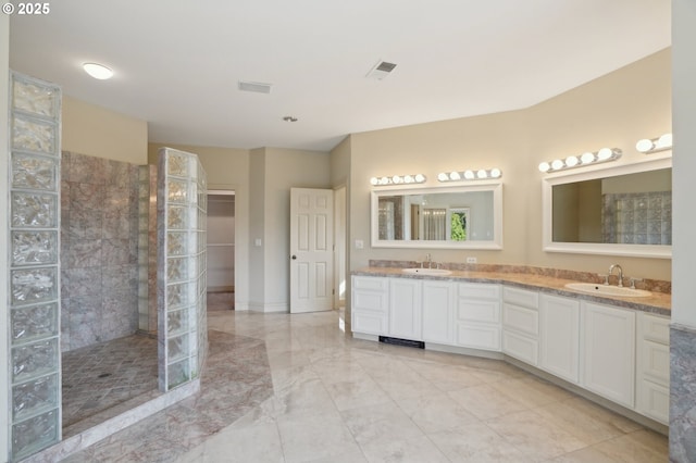 full bathroom featuring a sink, walk in shower, double vanity, and visible vents