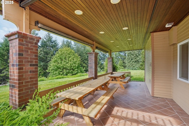 view of patio featuring outdoor dining area