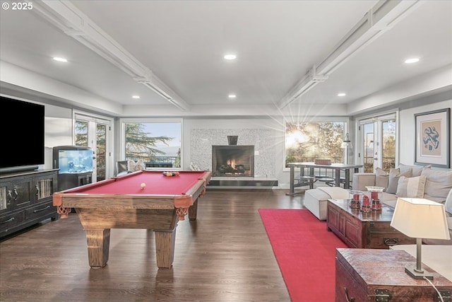 playroom with dark wood-type flooring, beam ceiling, and billiards