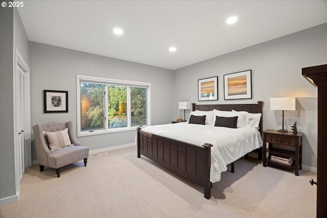 bedroom with light carpet