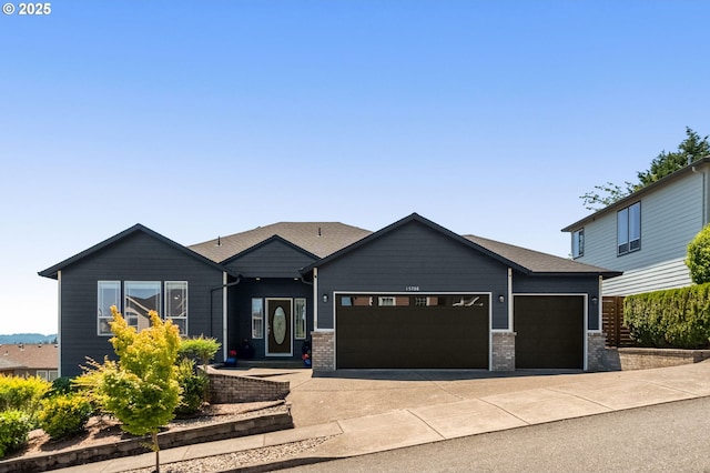 15708 SE Bybee Dr, Portland, OR 97236 - view of front of house with a garage, brick siding, and concrete driveway