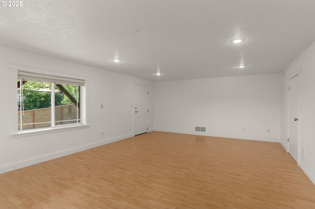 15708 SE Bybee Dr, Portland, OR 97236 - empty room with light wood-type flooring and recessed lighting