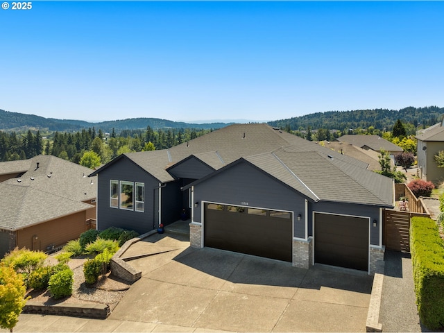 15708 SE Bybee Dr, Portland, OR 97236 - ranch-style house with a garage, concrete driveway, and a mountain view