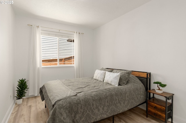 15708 SE Bybee Dr, Portland, OR 97236 - bedroom with wood finished floors and baseboards