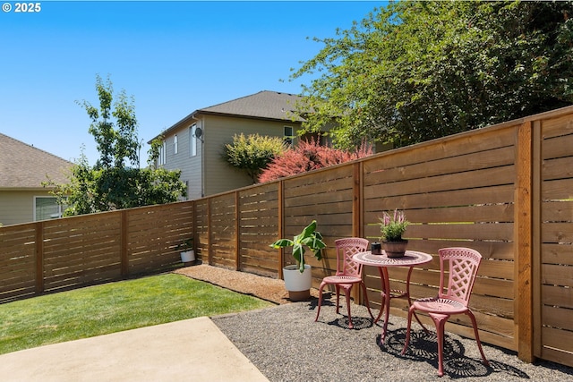 15708 SE Bybee Dr, Portland, OR 97236 - fenced backyard with a patio
