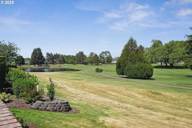 209 Mcnary Estates Dr N, Keizer, OR 97303 - surrounding community with a water view, view of golf course, and a yard