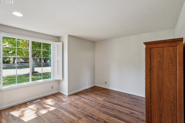 209 Mcnary Estates Dr N, Keizer, OR 97303 - unfurnished room with wood-type flooring and recessed lighting