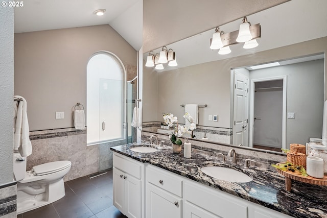 209 Mcnary Estates Dr N, Keizer, OR 97303 - full bath with tile walls, tile patterned flooring, double vanity, a wainscoted wall, and a shower