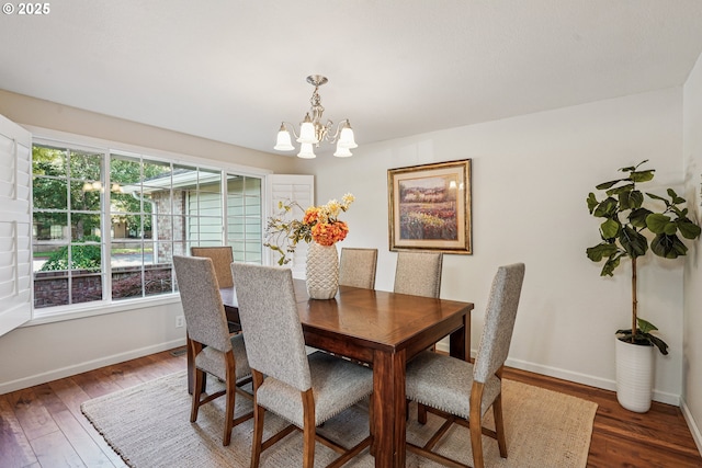 209 Mcnary Estates Dr N, Keizer, OR 97303 - dining room featuring a chandelier and wood finished floors