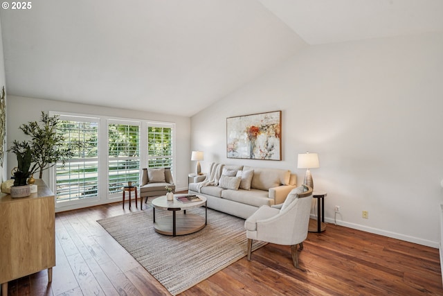 209 Mcnary Estates Dr N, Keizer, OR 97303 - living room featuring vaulted ceiling and wood-type flooring