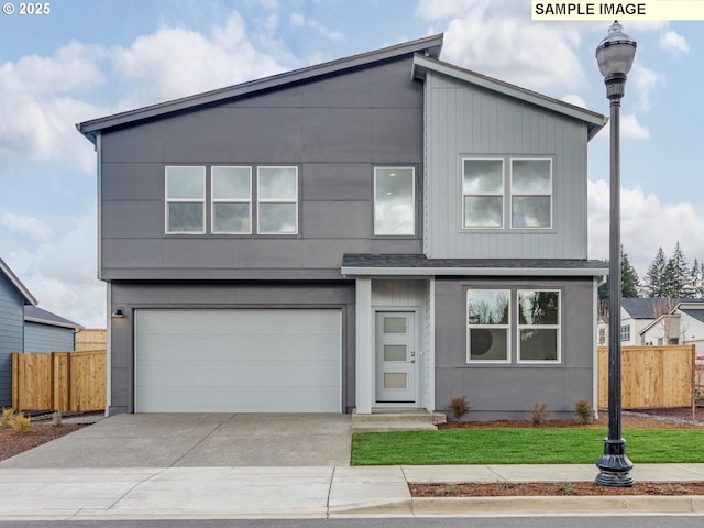 239 NW 29th Way, Battle Ground, WA 98604 - modern home featuring an attached garage, fence, and concrete driveway