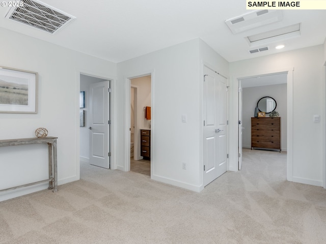 239 NW 29th Way, Battle Ground, WA 98604 - unfurnished bedroom featuring visible vents, attic access, baseboards, and light colored carpet