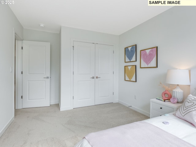 239 NW 29th Way, Battle Ground, WA 98604 - carpeted bedroom with baseboards and a closet